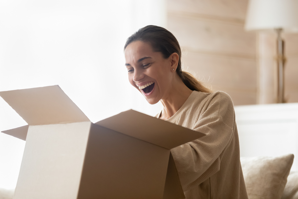 woman happy getting delivery