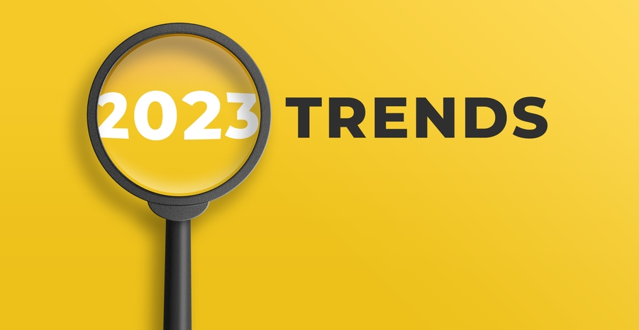 Magnifying glass with 2023 trends highlighted.