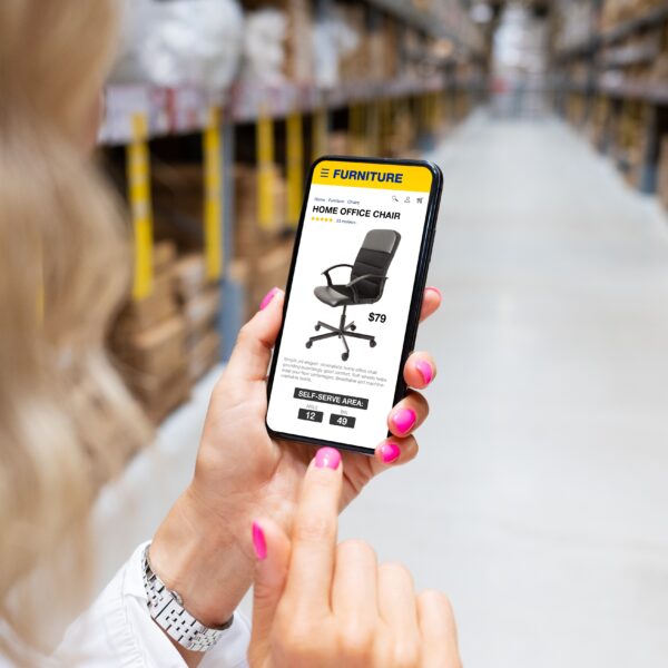 Woman,Picking,Up,Furniture,In,Store’s,Warehouse